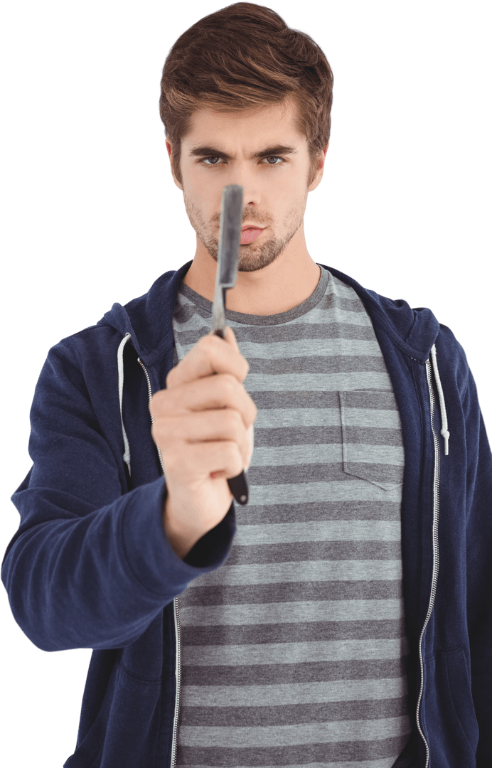 Man Holding Straight Edge Razor in Focus on Transparent Background