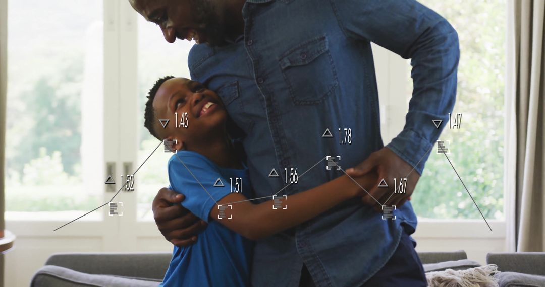 Smiling Father and Son Embracing at Home in Living Room