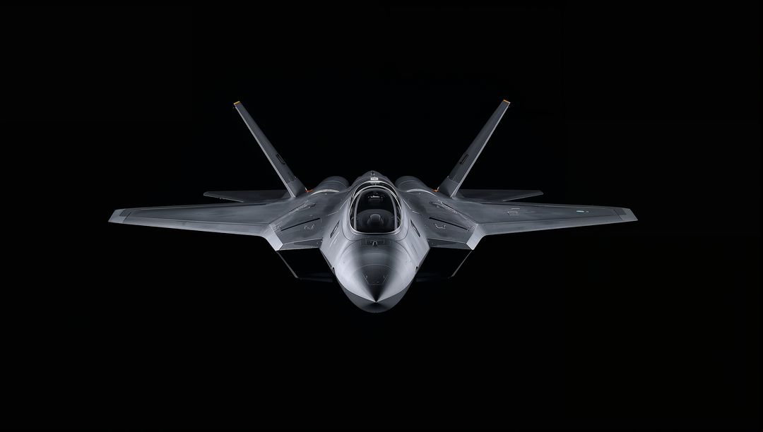 Illuminating Stealth Fighter Jet Against Black Background