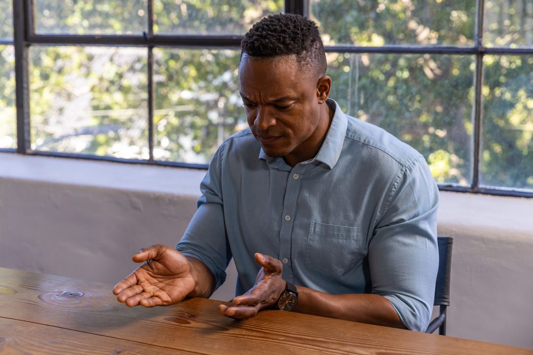Thoughtful Man in Office, Introspective and Calm by Window Light