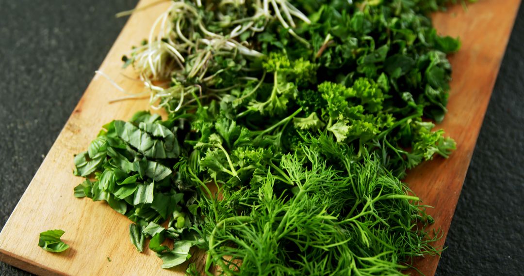 Variety of Fresh Green Herbs on Wooden Cutting Board - Free Images, Stock Photos and Pictures on Pikwizard.com