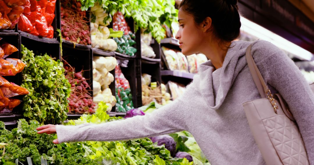 Woman Choosing Fresh Vegetables in Organic Section - Free Images, Stock Photos and Pictures on Pikwizard.com