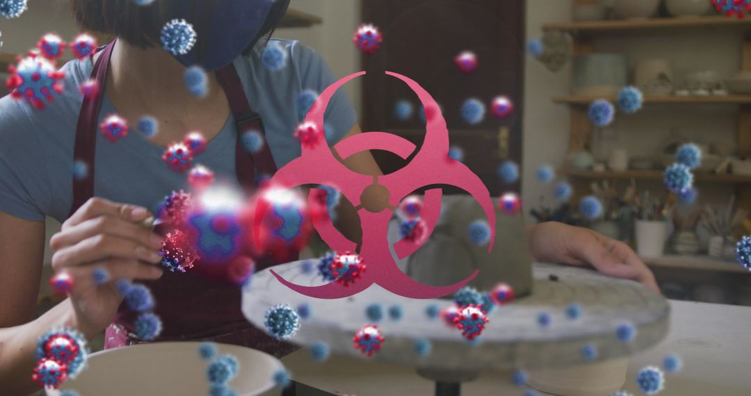 Pottery Artisan Creating with Biohazard Warning and Virus Symbols