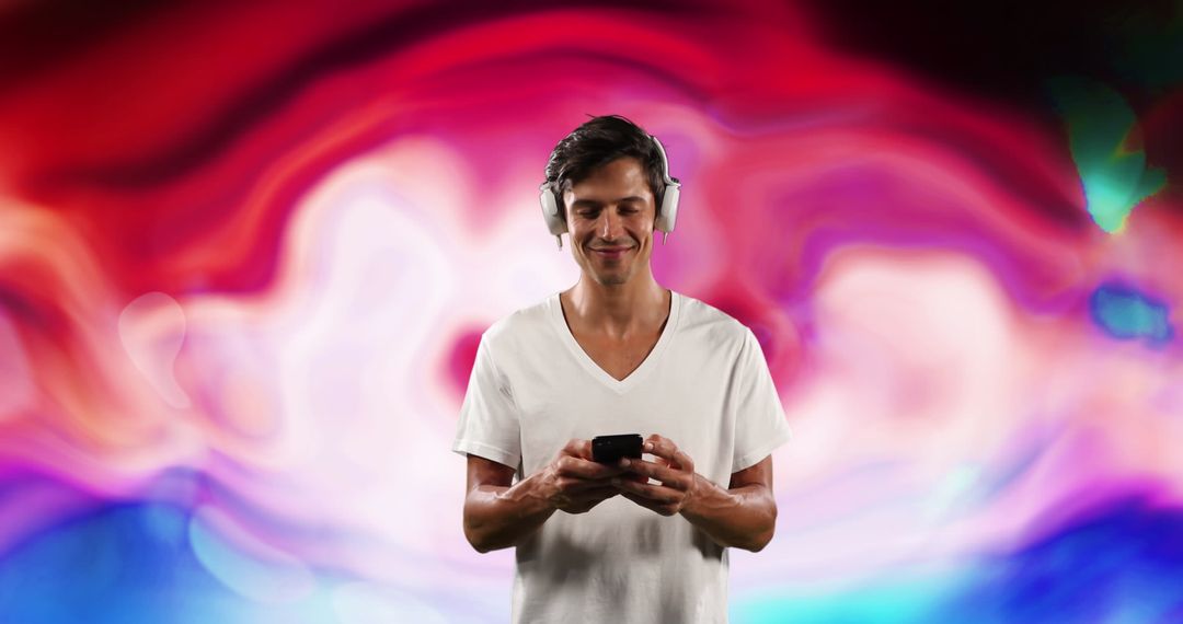 Young Man Engaging with Smartphone Technology