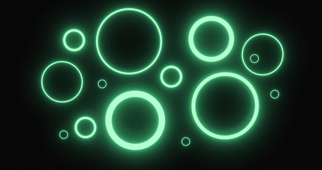 Pulsating Glowing Neon Green Rings on Dark Background
