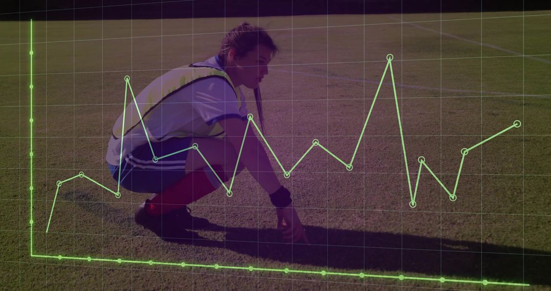 Athlete Assessing Performance Data On Grass Field