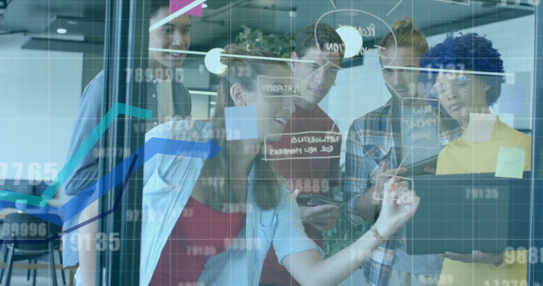 Young Multicultural Team Analyzing Business Data Trends