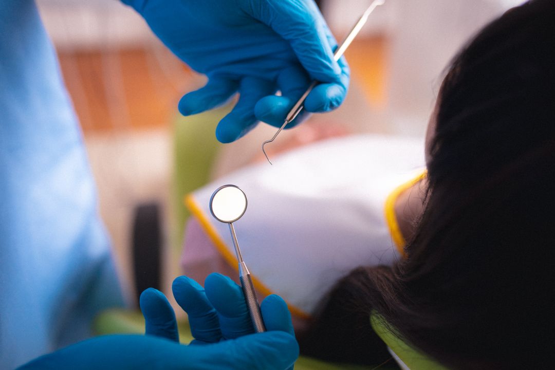 Image of hands of male dentist with tools and female patient - Free Images, Stock Photos and Pictures on Pikwizard.com