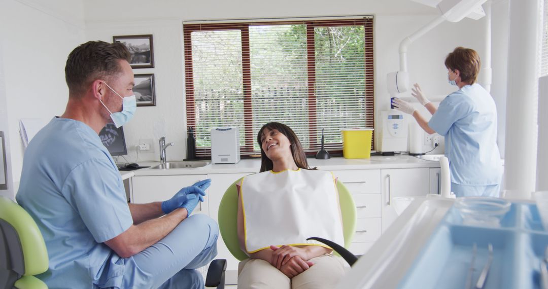 Dentist Preparing Patient in Modern Clinic During Pandemic - Free Images, Stock Photos and Pictures on Pikwizard.com