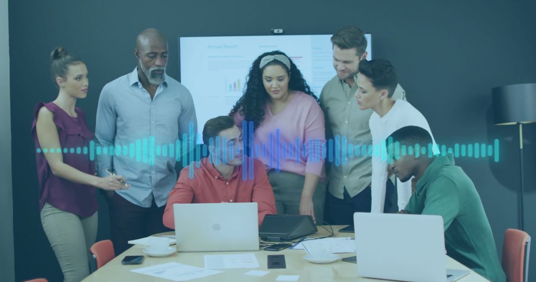 Diverse Team Collaborates on Data Visualization in Modern Office