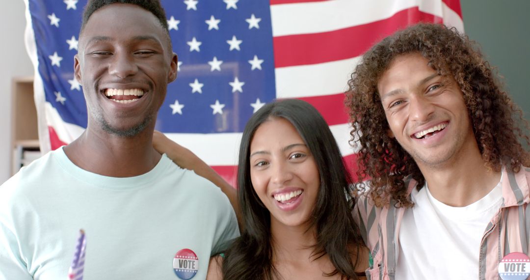 Diverse Friends Celebrating Voting in Front of American Flag