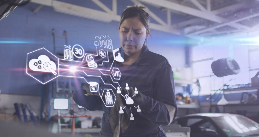 Female Mechanic Engaging with Digital Interface in Workshop