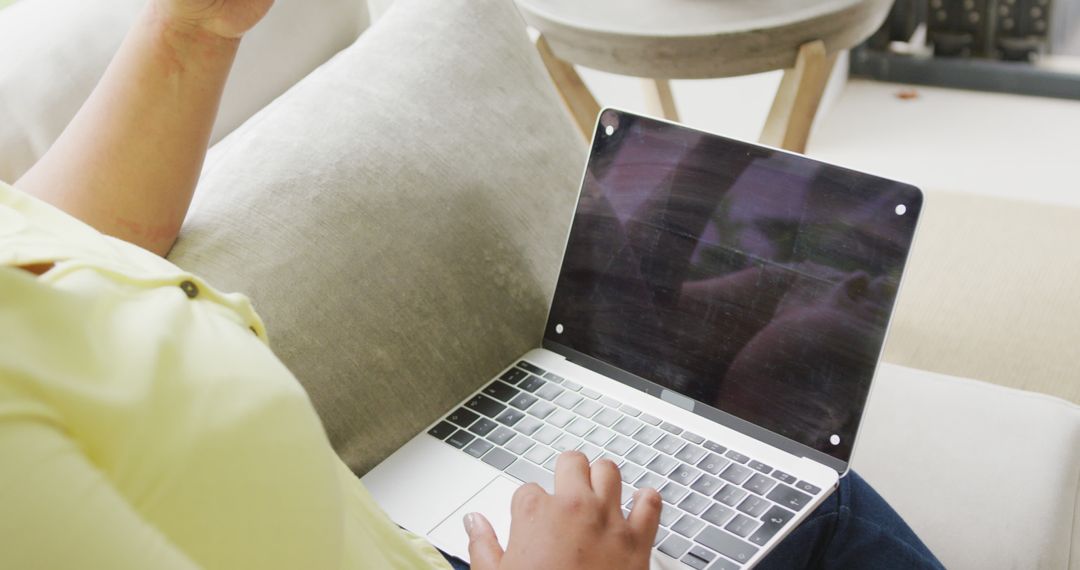 Person Using Laptop While Taking a Break at Home - Free Images, Stock Photos and Pictures on Pikwizard.com