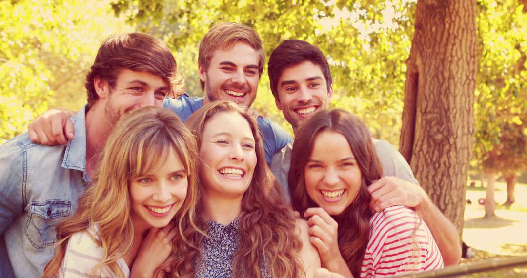 Close Friends Smiling and Taking Selfie Outdoors in Park - Free Images, Stock Photos and Pictures on Pikwizard.com