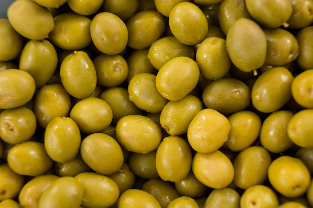 Close-Up of Marinated Green Olives - Free Images, Stock Photos and Pictures on Pikwizard.com