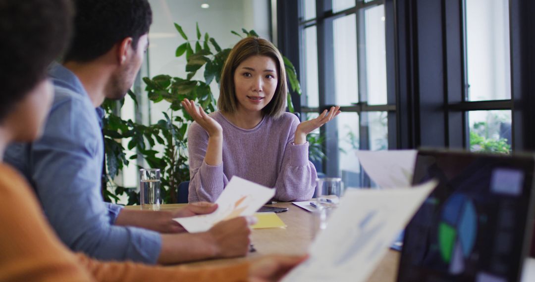 Team Collaboration at Modern Office Table Discussion