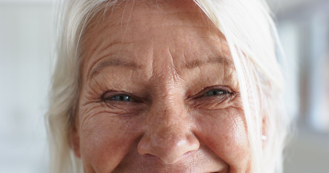 Close-Up of Joyful Senior Woman’s Eyes Indoors - Free Images, Stock Photos and Pictures on Pikwizard.com