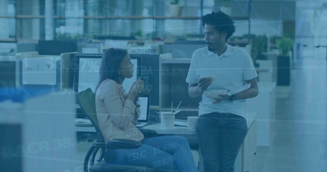 Colleagues Enjoying Break Time in Modern Office Workspace