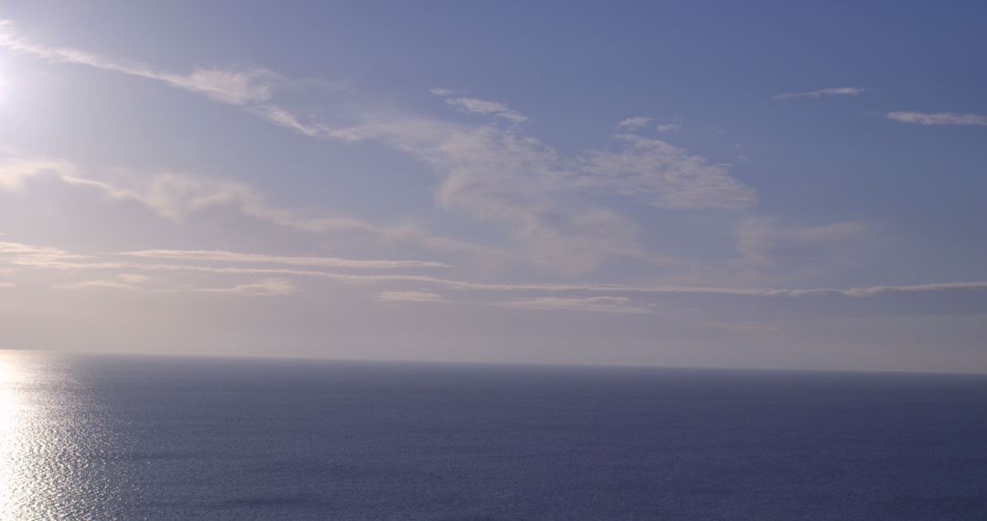 Peaceful Ocean Horizon under Clear Blue Sky - Free Images, Stock Photos and Pictures on Pikwizard.com