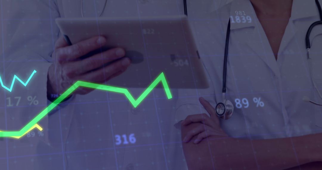 Doctors Analyzing Medical Data with Digital Technology