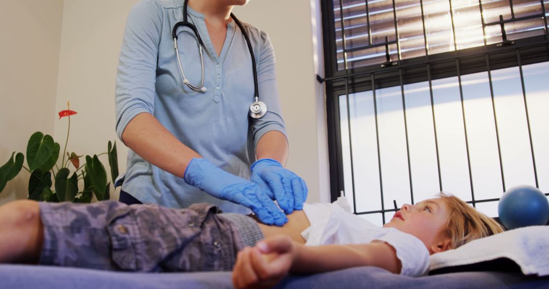 Pediatrician Examining Young Patient in Clinic - Free Images, Stock Photos and Pictures on Pikwizard.com