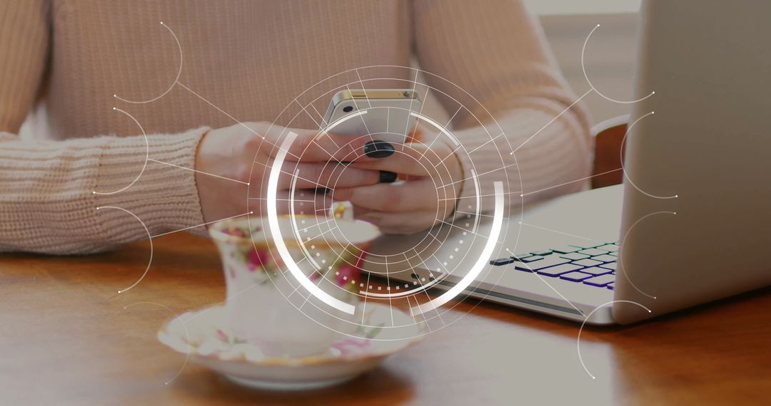 Person Navigating Smartphone with Digital Interface in Cozy Workspace