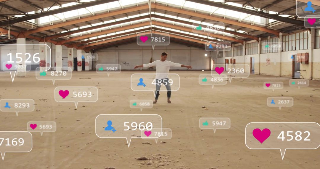 Man Engaging Social Media Metrics in Open Warehouse