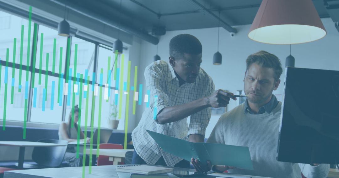 Team Analyzing Financial Data on Computer in Modern Office