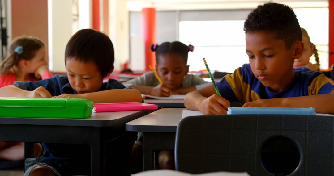 Diverse Children Focused on Learning in Classroom