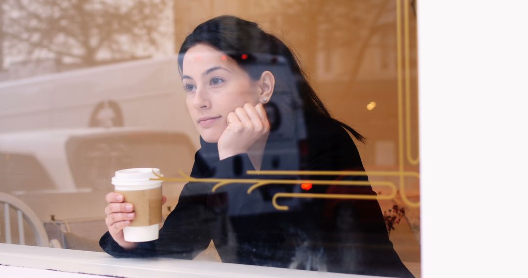 Woman Enjoying Coffee in Café Window - Free Images, Stock Photos and Pictures on Pikwizard.com