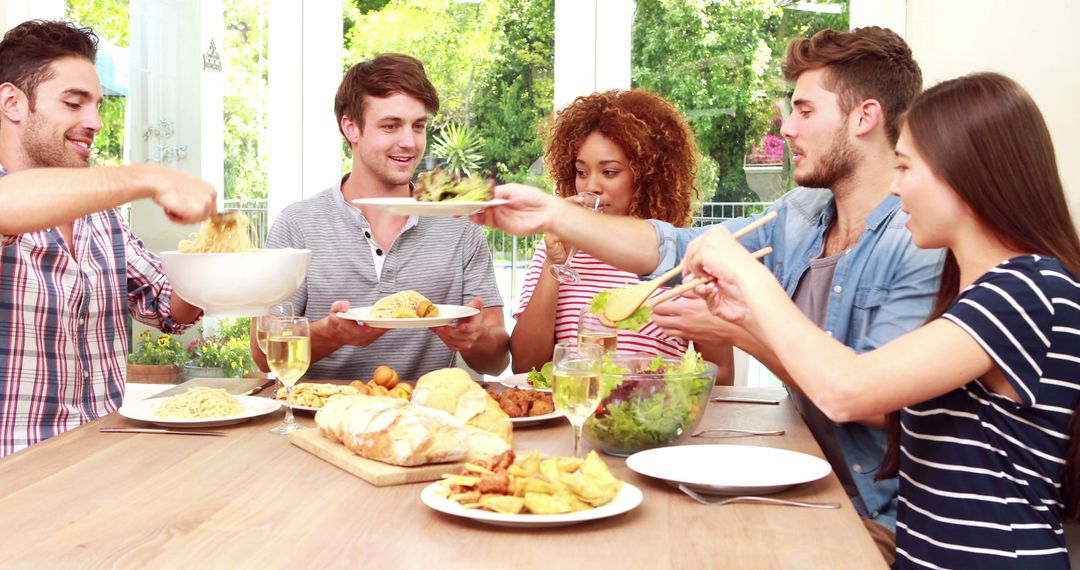 Group of Friends Enjoying Meal Together at Home - Free Images, Stock Photos and Pictures on Pikwizard.com