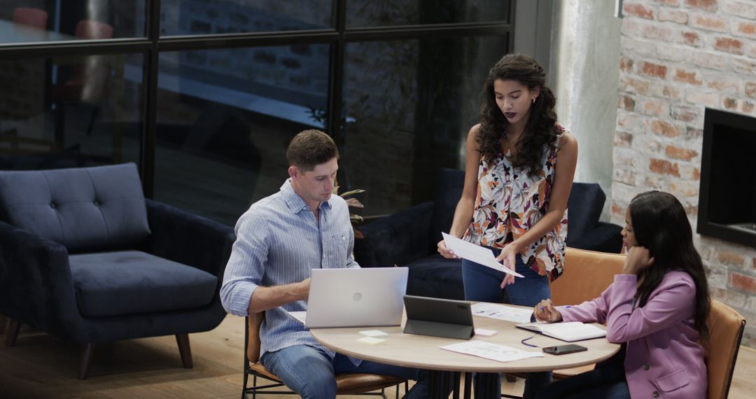 Focused Professionals Collaborating in Modern Office Setting