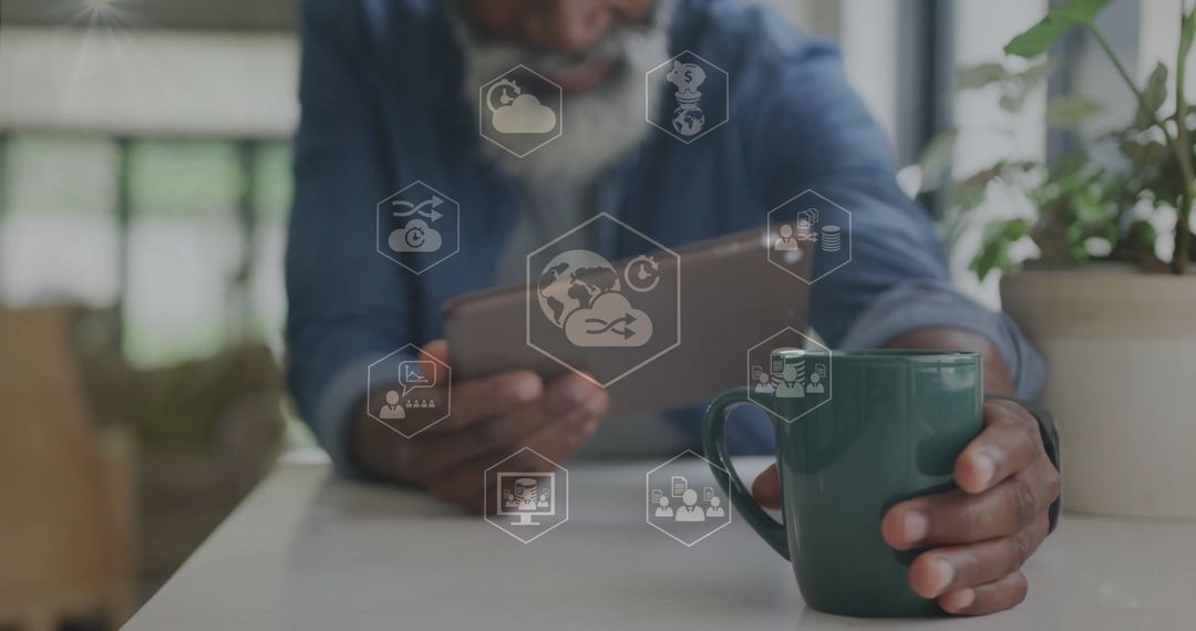 Man Holding Coffee Mug and Tablet in Modern Workspace