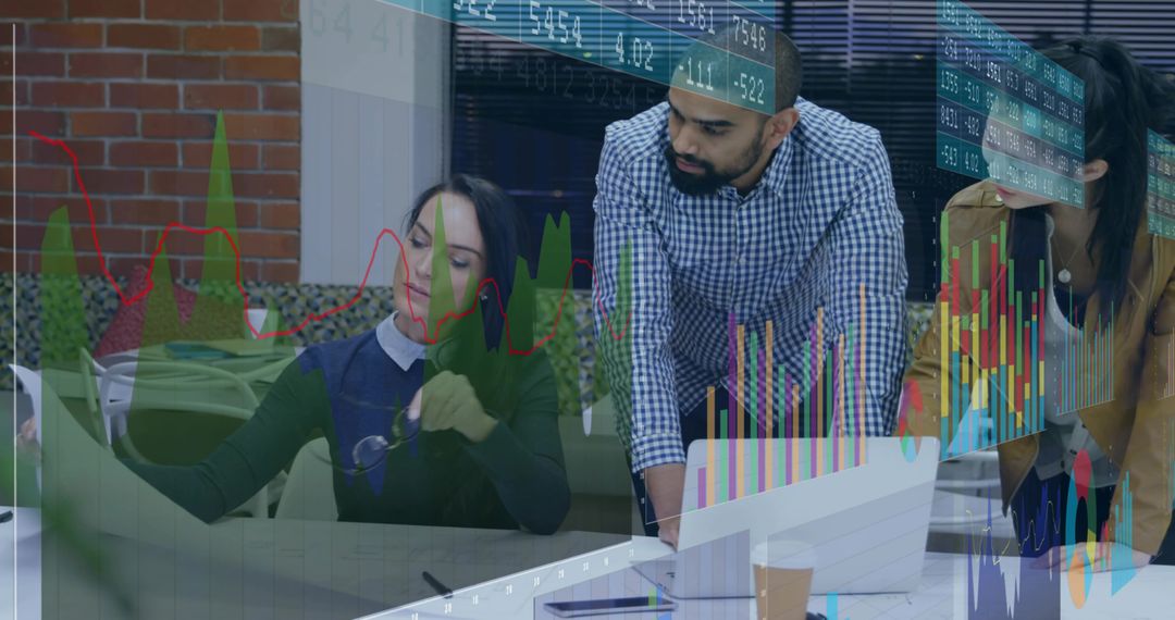 Business team collaborating over laptop with stock market charts and data visualizations