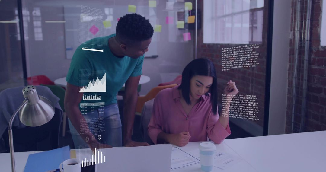 Colleagues Collaborating in Modern High-Tech Office Setting