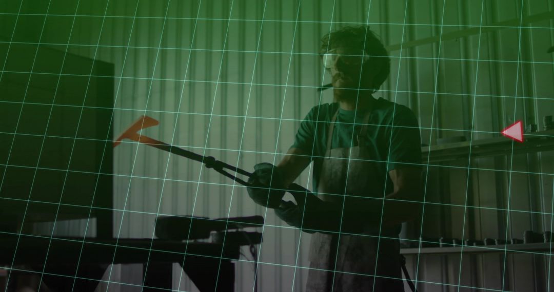 Artisan Manipulating Molten Glass on Rod in Industrial Workshop