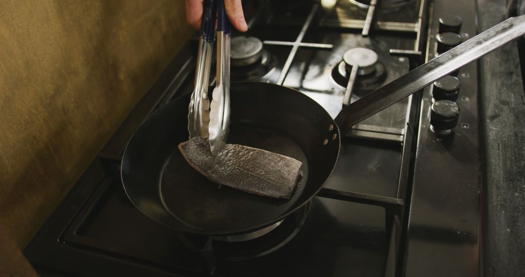 Home Cooking: Frying Fish Fillet on Stove - Free Images, Stock Photos and Pictures on Pikwizard.com