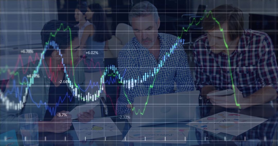 Diverse Business Team Analyzing Financial Data on Digital Graph