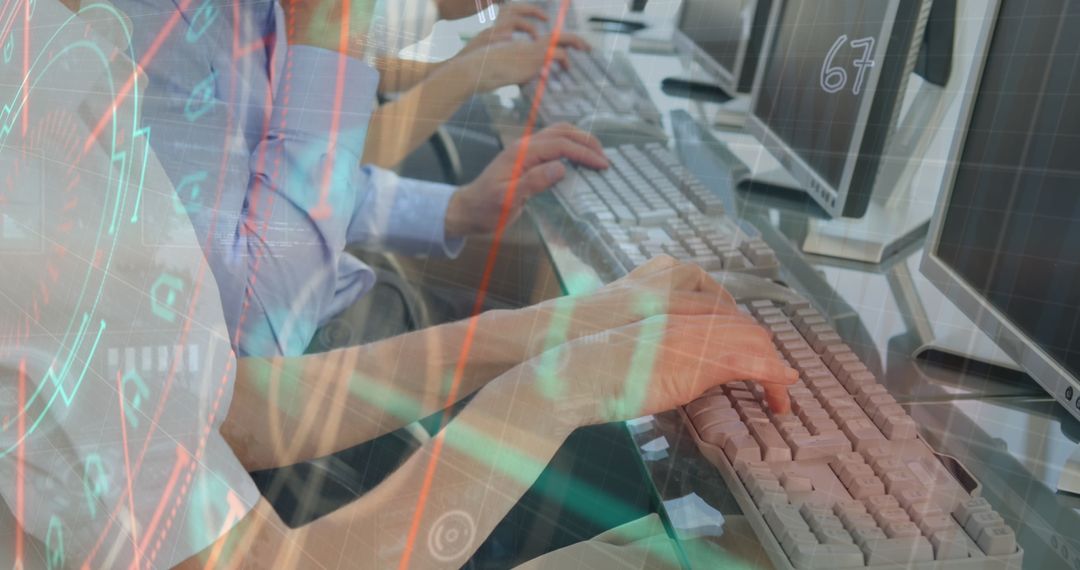 Business Professionals Analyzing Data on Multiple Computers