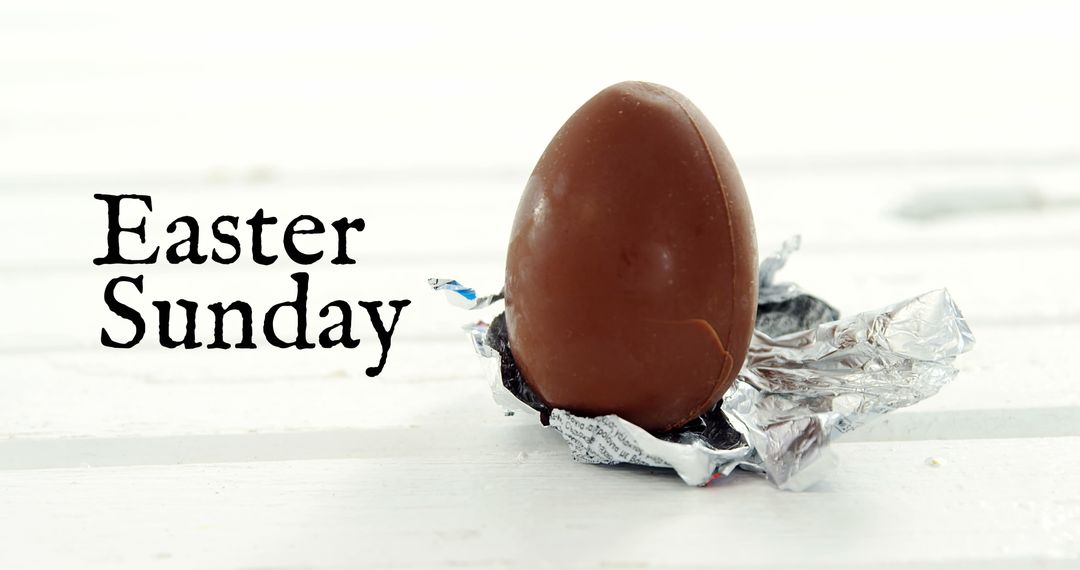 Chocolate Easter Egg on White Background with Easter Sunday Text
