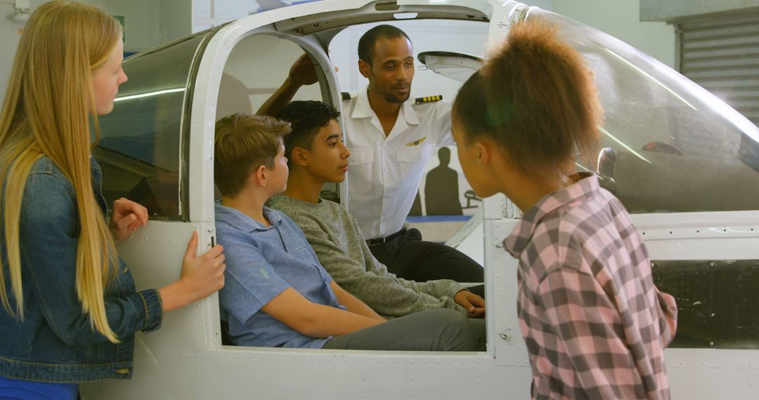 Teens Learning About Aviation in Aircraft Cockpit Guide