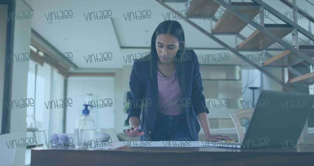 Professional Woman Analyzing Data in Office Environment