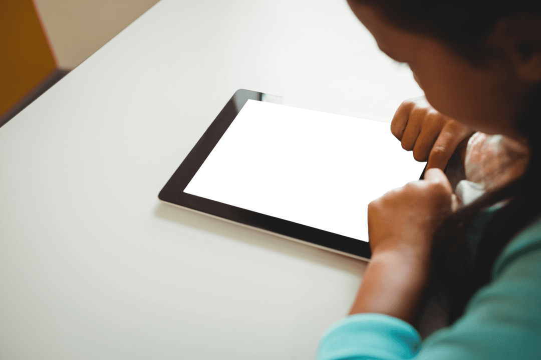 Child Using Tablet Cleverly on Transparent Table Surface - Download Free Stock Images Pikwizard.com