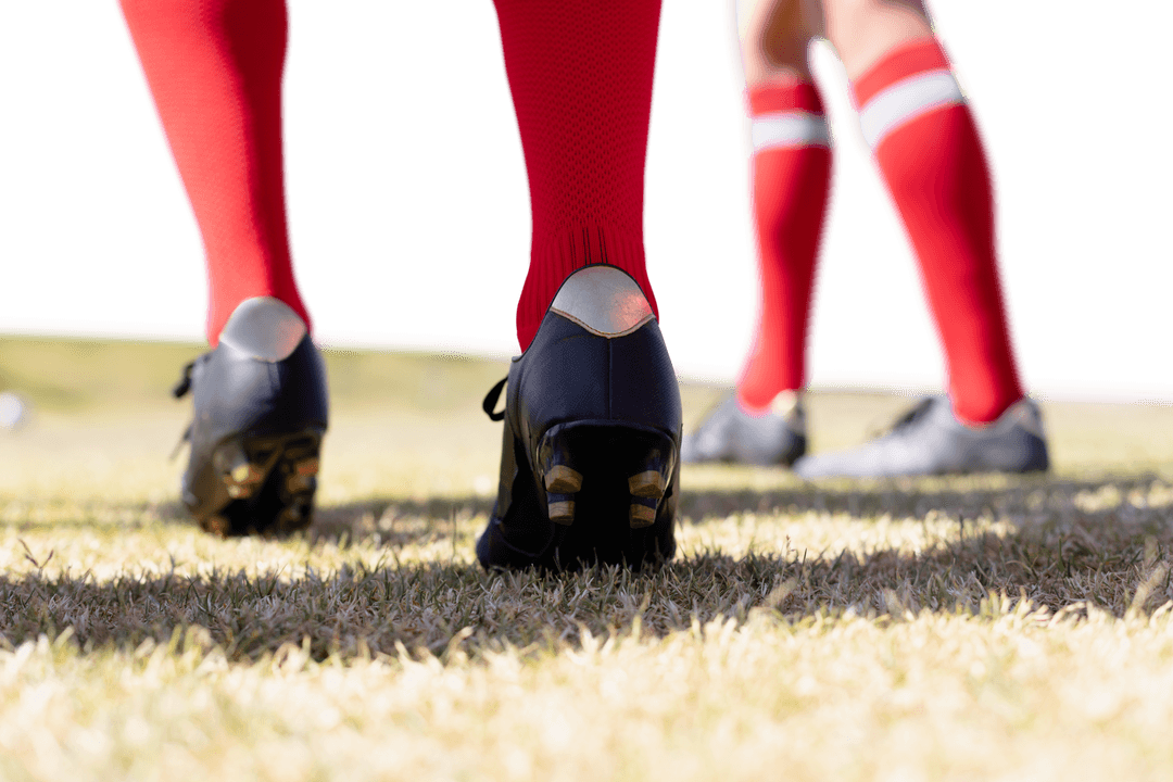 Footballer Legs in Red Socks on Transparent Background