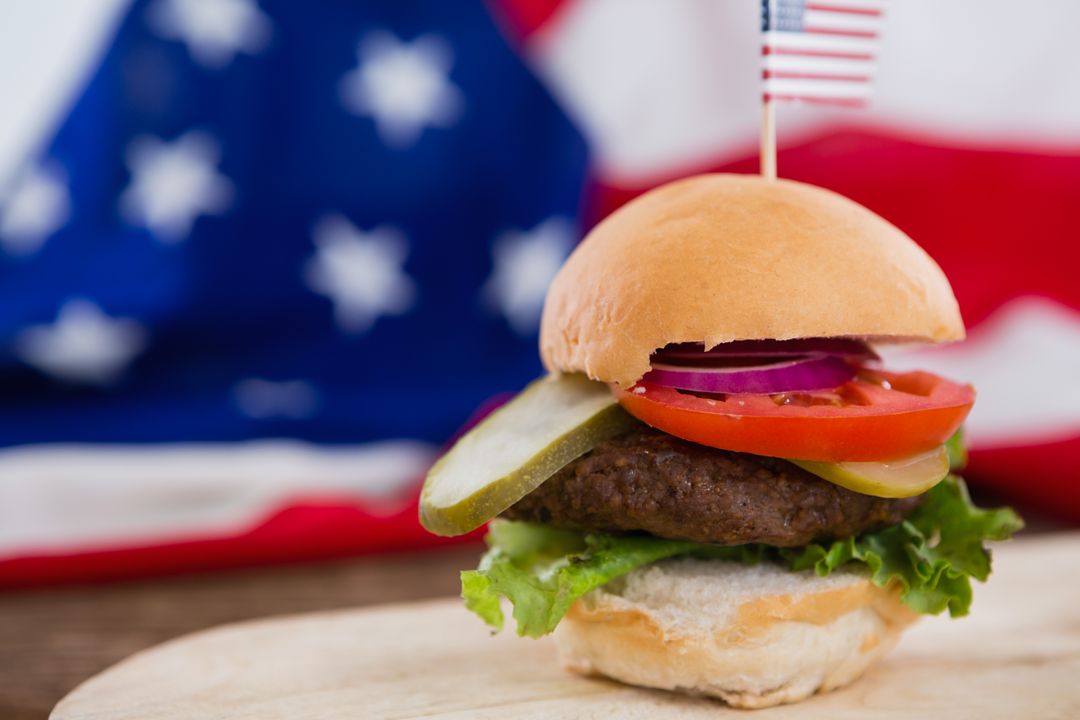 Close-up of Delicious Burger with American Flag - Free Images, Stock Photos and Pictures on Pikwizard.com