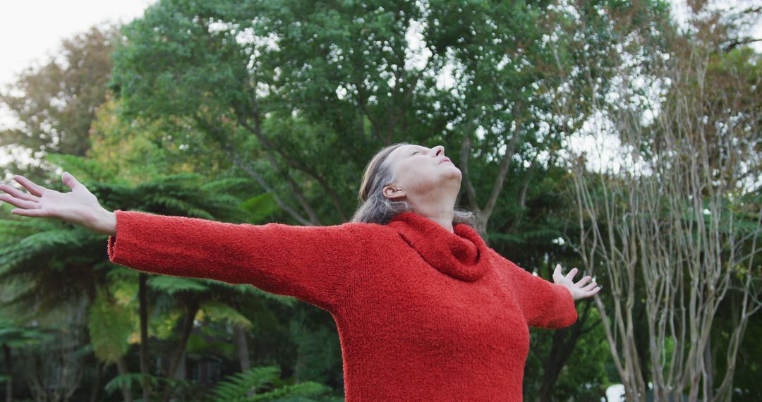 Woman Enjoying Fresh Air in Nature with Open Arms - Free Images, Stock Photos and Pictures on Pikwizard.com