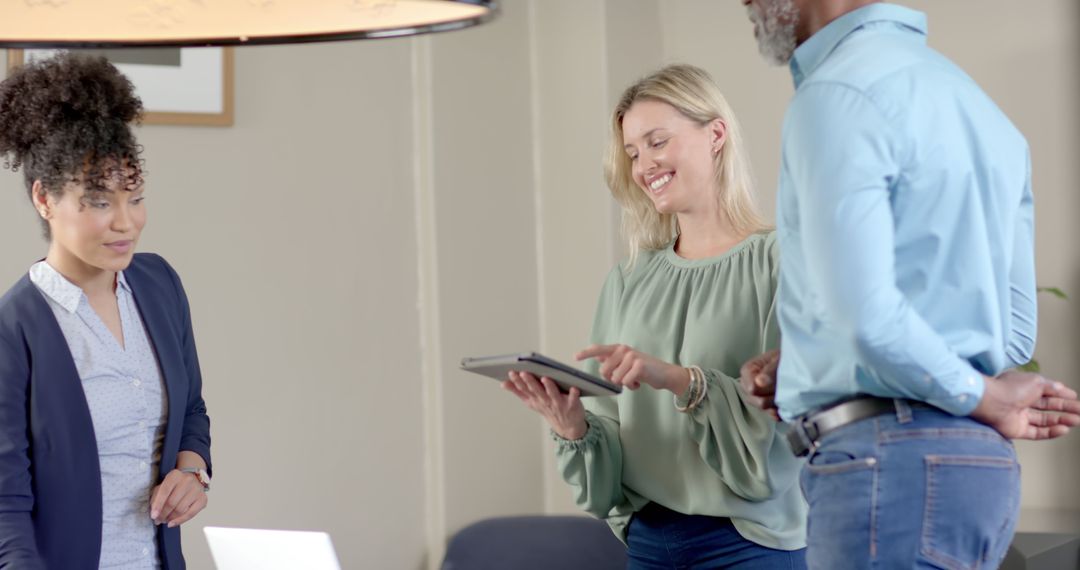 Diverse Business Team Collaborating with Latest Technology