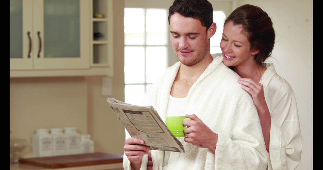 Relaxed Morning Routine with Young Couple Reading Newspaper