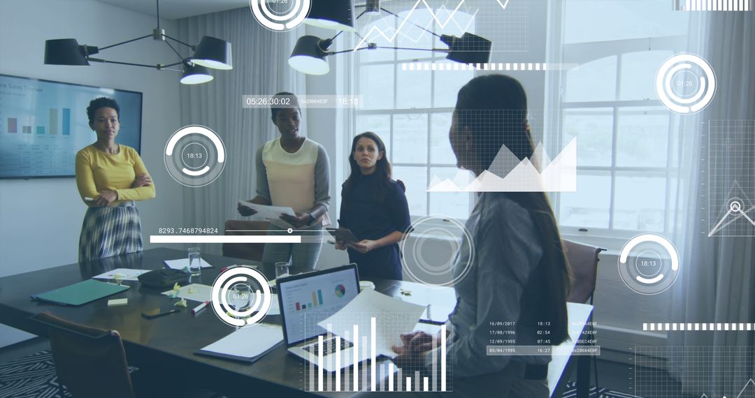 Diverse Women Discussing Data Analysis in Modern Office