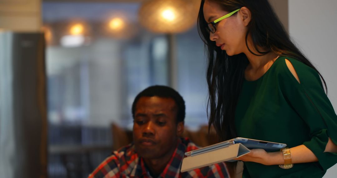 Multicultural Colleagues Engaging in Office Discussion